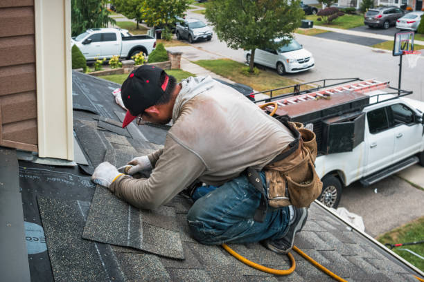 Professional Roofing technician working in Baltic, CT